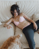 Woman in pink lingerie set on a sofa — MY PANTIES
